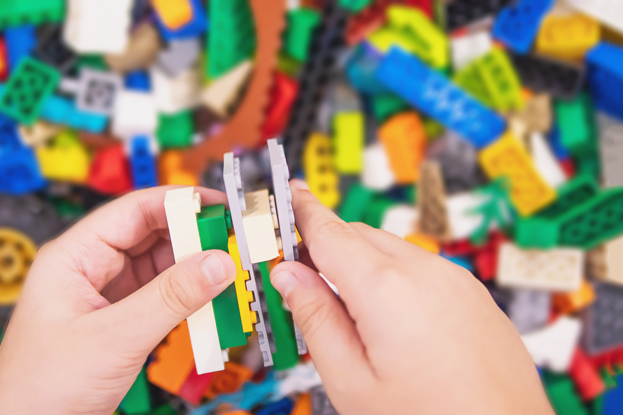 Kid Playing with Legos